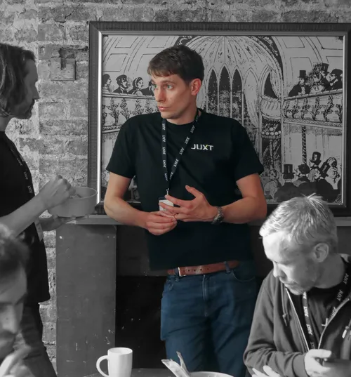 A headshot of Tom Dalziel